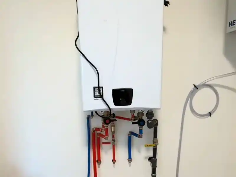 New tankless water heater installed after replacement in a Bonita Springs garage